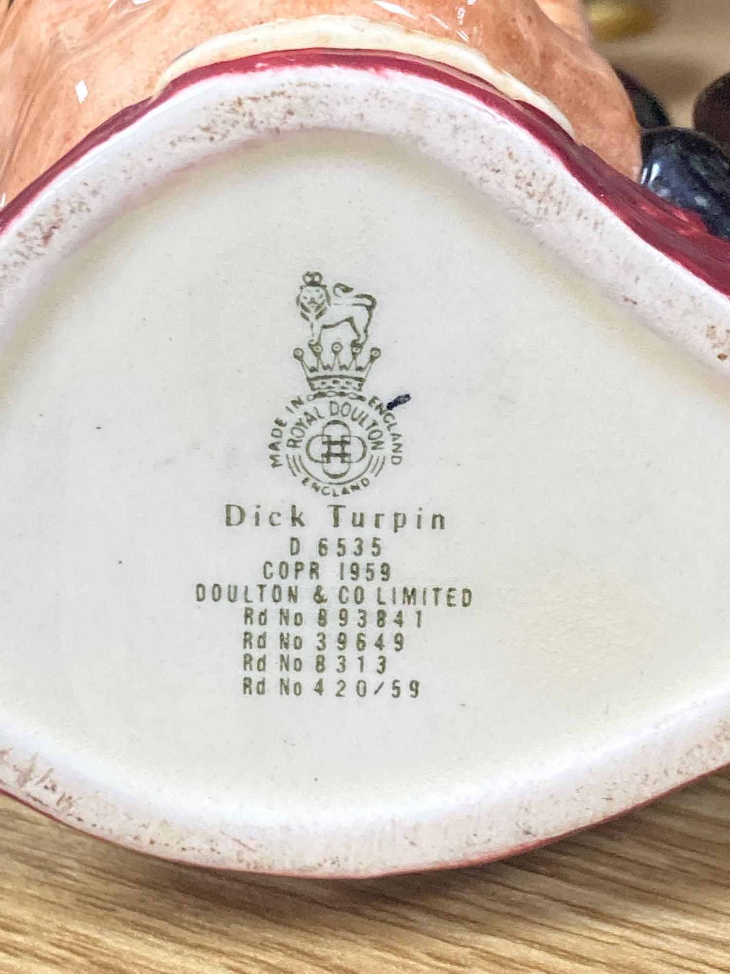 Eight Royal Doulton medium character jugs and seventeen Royal Doulton small character jugs (25)